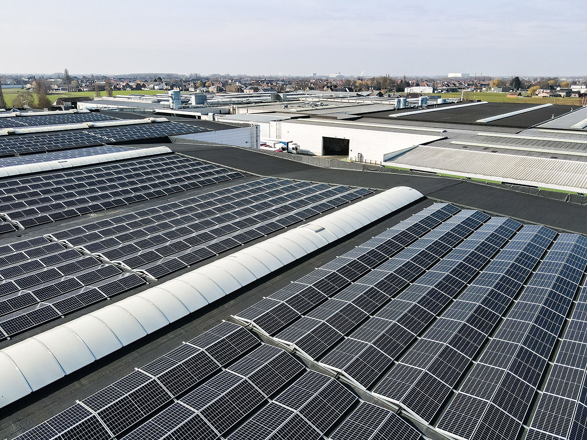 A rooftop covered with solar panels, showcasing sustainable energy solutions for urban architecture.